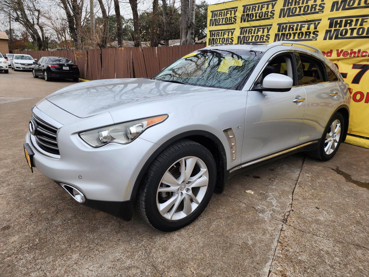 2016 Silver /Gray Infiniti QX70 Base (JN8CS1MU5GM) with an 3.7L V6 DOHC 24V engine, 7A transmission, located at 16710 Clay Rd., Houston, TX, 77084, (281) 859-7900, 29.834864, -95.656166 - Photo#1