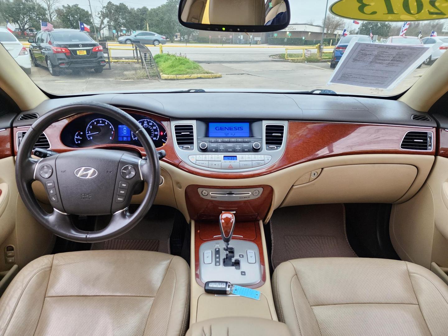 2013 Silver /Beige Hyundai Genesis 3.8L (KMHGC4DD7DU) with an 3.8L V6 DOHC 24V engine, 6-Speed Automatic transmission, located at 16710 Clay Rd., Houston, TX, 77084, (281) 859-7900, 29.834864, -95.656166 - Photo#9