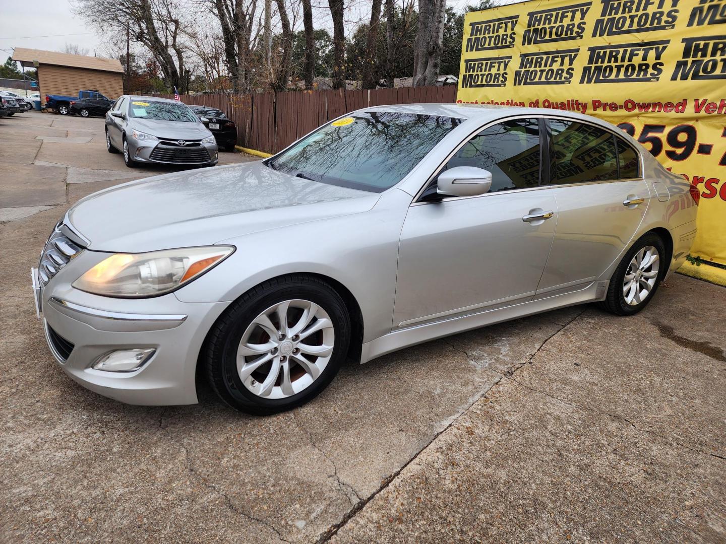 2013 Silver /Beige Hyundai Genesis 3.8L (KMHGC4DD7DU) with an 3.8L V6 DOHC 24V engine, 6-Speed Automatic transmission, located at 16710 Clay Rd., Houston, TX, 77084, (281) 859-7900, 29.834864, -95.656166 - Photo#1