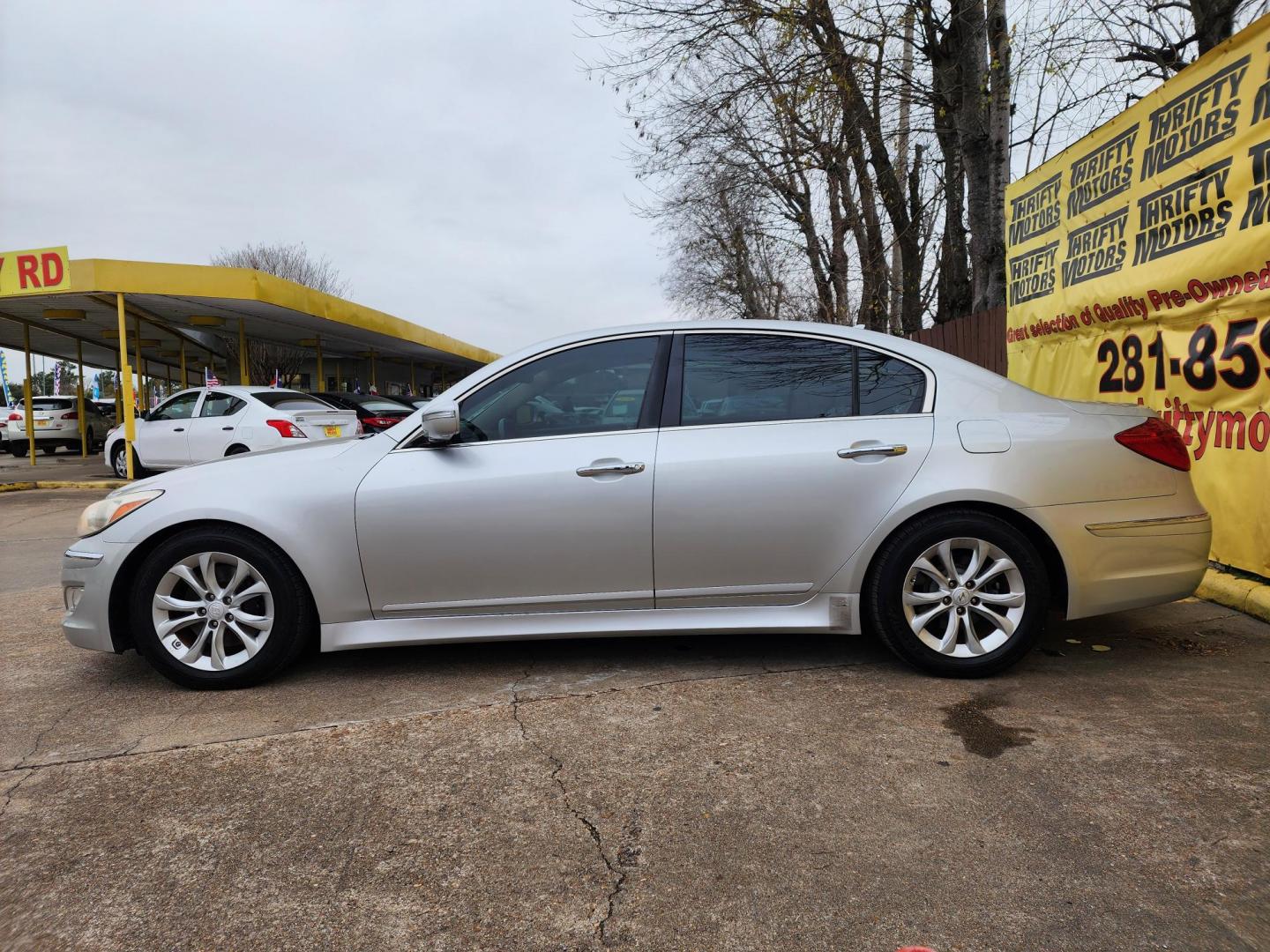 2013 Silver /Beige Hyundai Genesis 3.8L (KMHGC4DD7DU) with an 3.8L V6 DOHC 24V engine, 6-Speed Automatic transmission, located at 16710 Clay Rd., Houston, TX, 77084, (281) 859-7900, 29.834864, -95.656166 - Photo#4