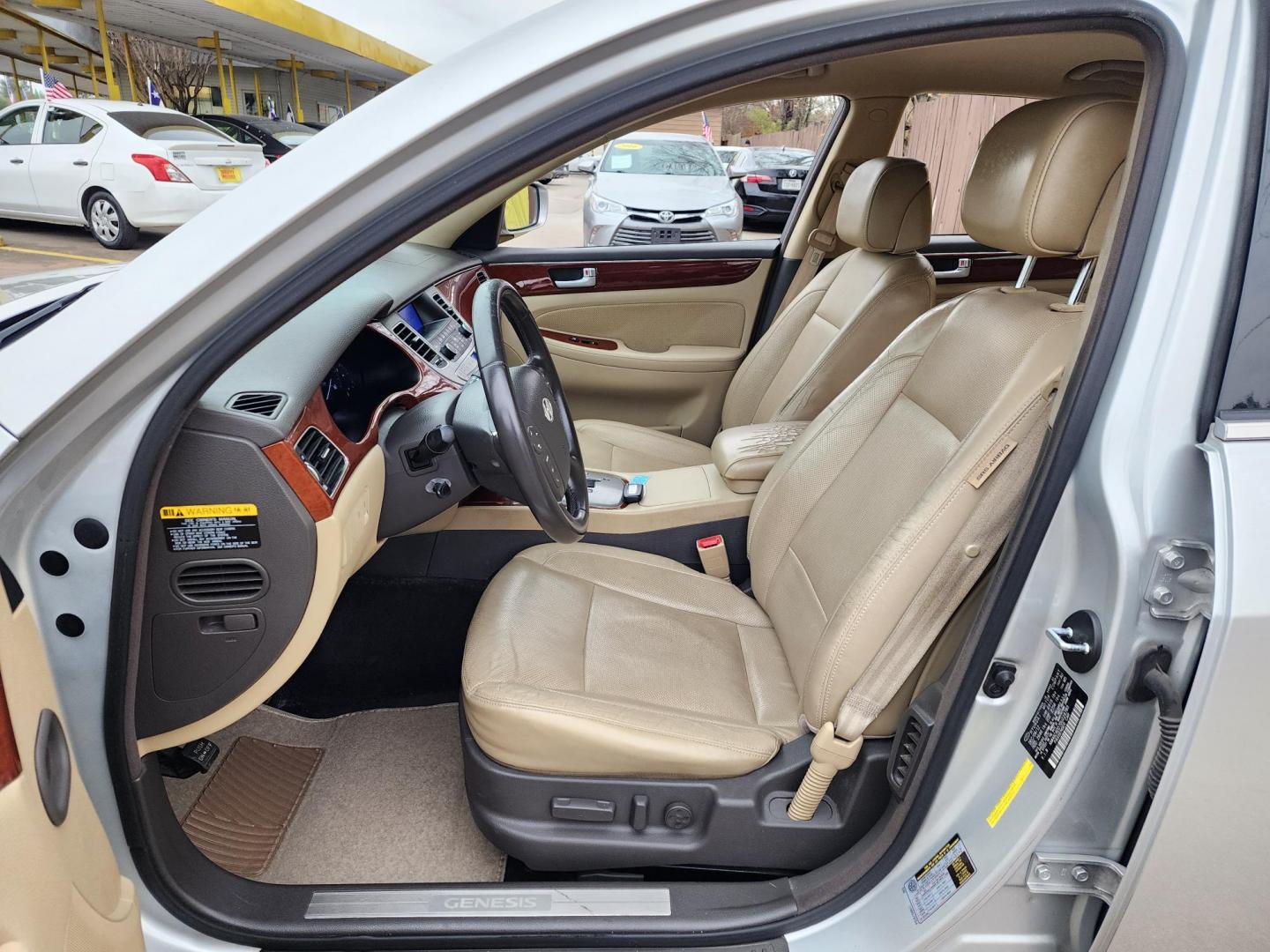 2013 Silver /Beige Hyundai Genesis 3.8L (KMHGC4DD7DU) with an 3.8L V6 DOHC 24V engine, 6-Speed Automatic transmission, located at 16710 Clay Rd., Houston, TX, 77084, (281) 859-7900, 29.834864, -95.656166 - Photo#11