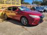 2016 Red /gray Toyota Camry SE (4T1BF1FK5GU) with an 2.5L L4 DOHC 16V engine, 6-Speed Automatic transmission, located at 16710 Clay Rd., Houston, TX, 77084, (281) 859-7900, 29.834864, -95.656166 - Photo#2