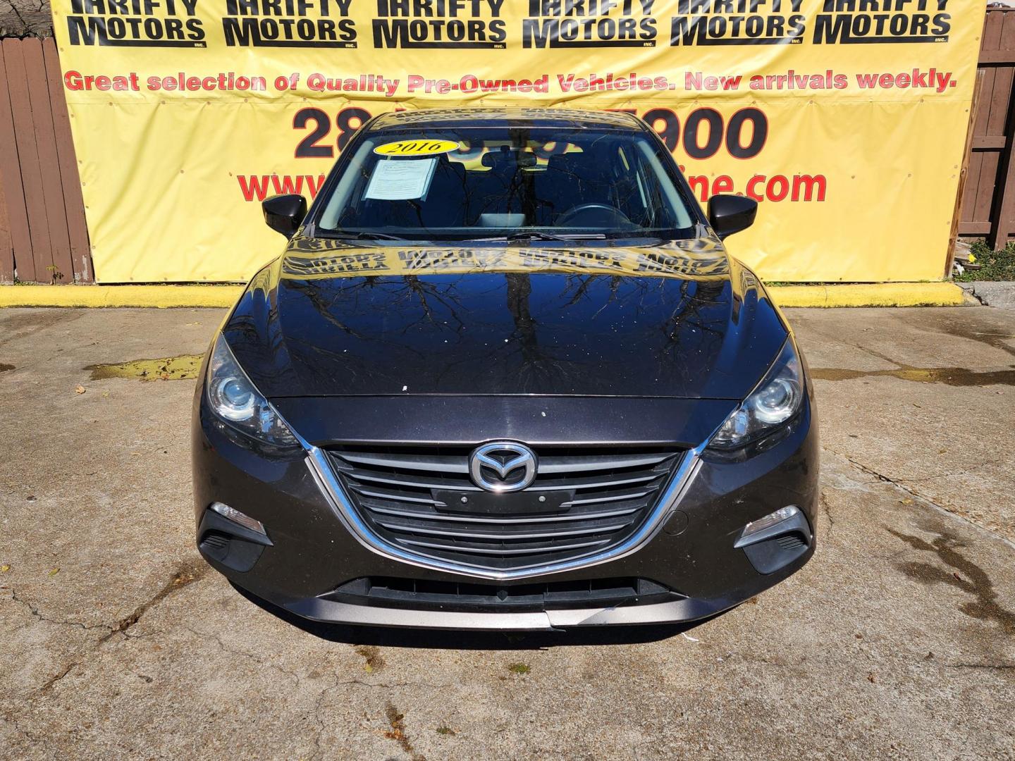 2016 Gray /gray Mazda MAZDA3 i Sport AT 4-Door (3MZBM1J7XGM) with an 2.0L L4 DOHC 16V engine, 6A transmission, located at 16710 Clay Rd., Houston, TX, 77084, (281) 859-7900, 29.834864, -95.656166 - Photo#0