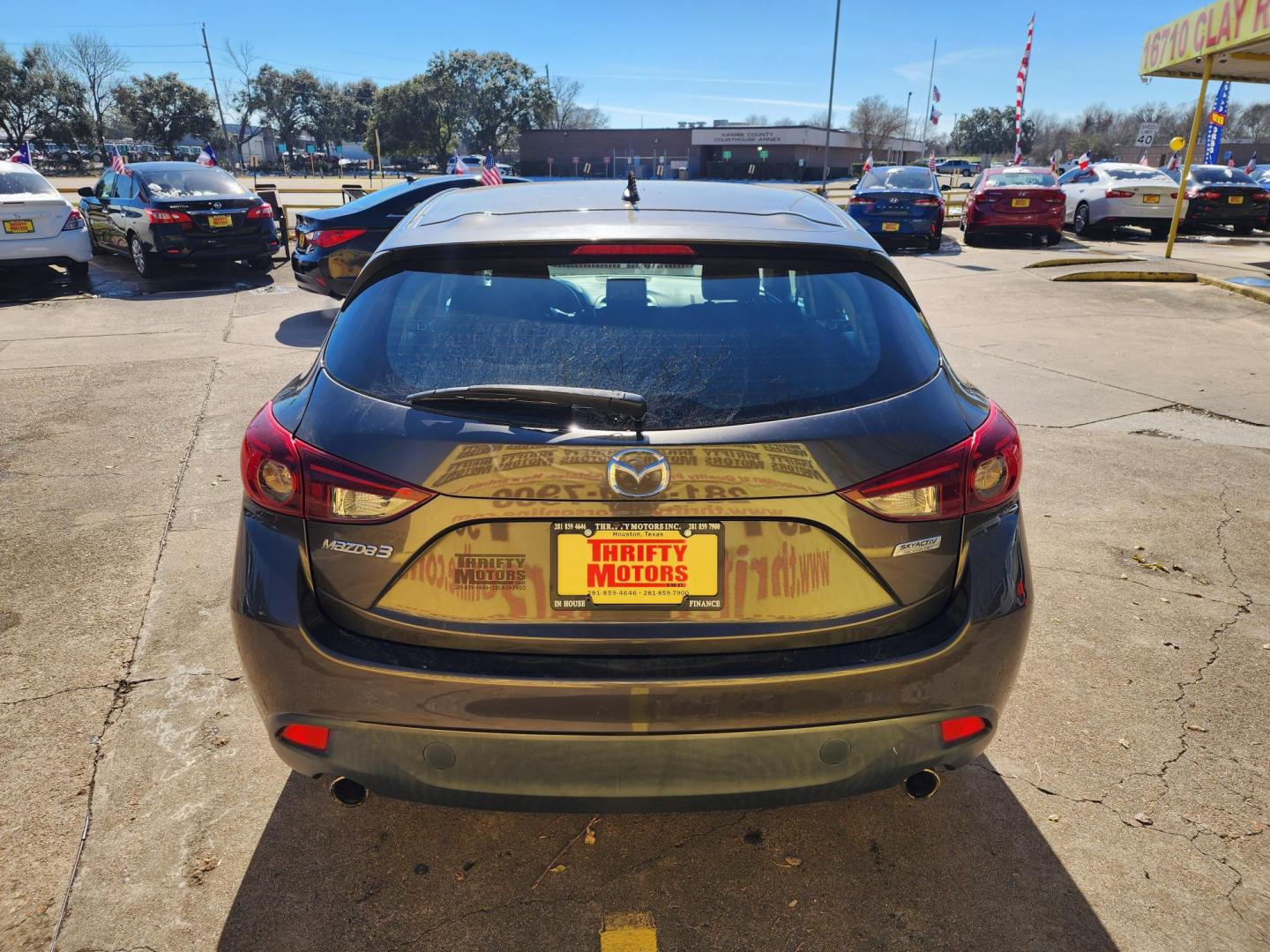 2016 Gray /gray Mazda MAZDA3 i Sport AT 4-Door (3MZBM1J7XGM) with an 2.0L L4 DOHC 16V engine, 6A transmission, located at 16710 Clay Rd., Houston, TX, 77084, (281) 859-7900, 29.834864, -95.656166 - Photo#16