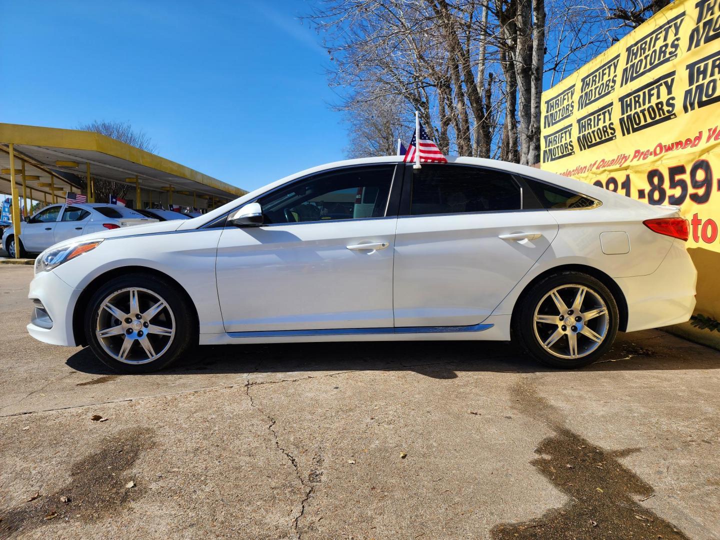 2017 White /BLACK Hyundai Sonata Sport 2.0T (5NPE34AB6HH) with an 2.0L L4 DOHC 16V TURBO engine, Automatic 6-Speed transmission, located at 16710 Clay Rd., Houston, TX, 77084, (281) 859-7900, 29.834864, -95.656166 - Photo#4