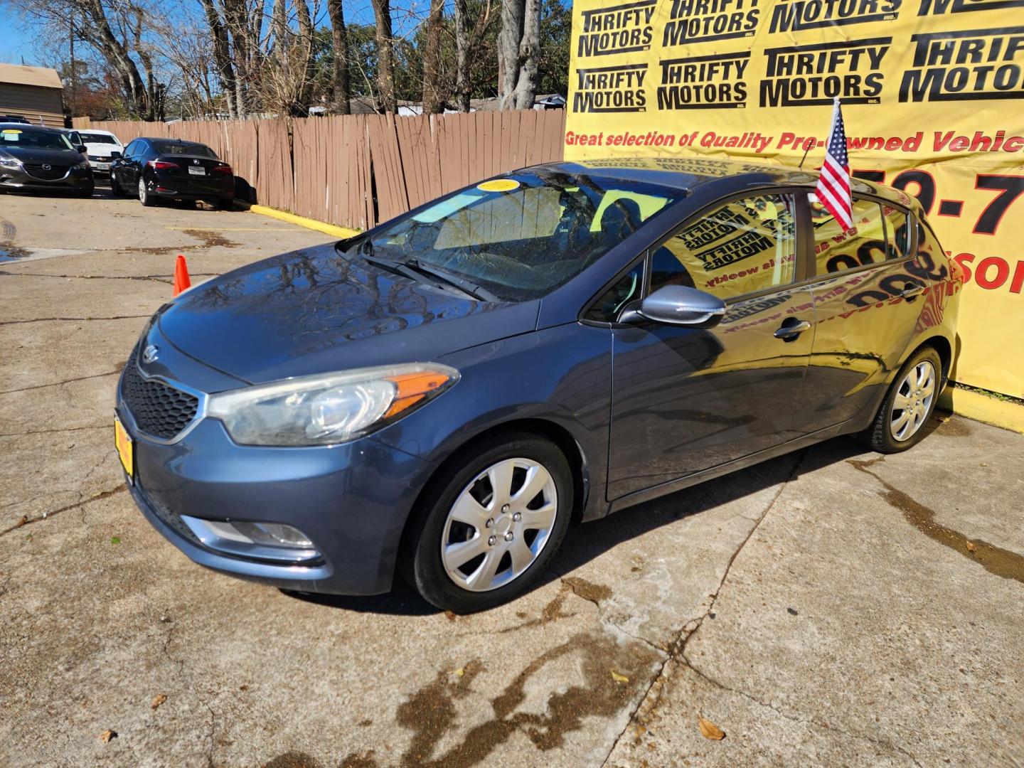 2016 Blue /Gray Kia Forte 5-Door LX (KNAFK5A80G5) with an 2.0L L4 DOHC 16V engine, Automatic 6-Speed transmission, located at 16710 Clay Rd., Houston, TX, 77084, (281) 859-7900, 29.834864, -95.656166 - Photo#1