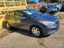 2016 Blue /Gray Kia Forte 5-Door LX (KNAFK5A80G5) with an 2.0L L4 DOHC 16V engine, Automatic 6-Speed transmission, located at 16710 Clay Rd., Houston, TX, 77084, (281) 859-7900, 29.834864, -95.656166 - Photo#2