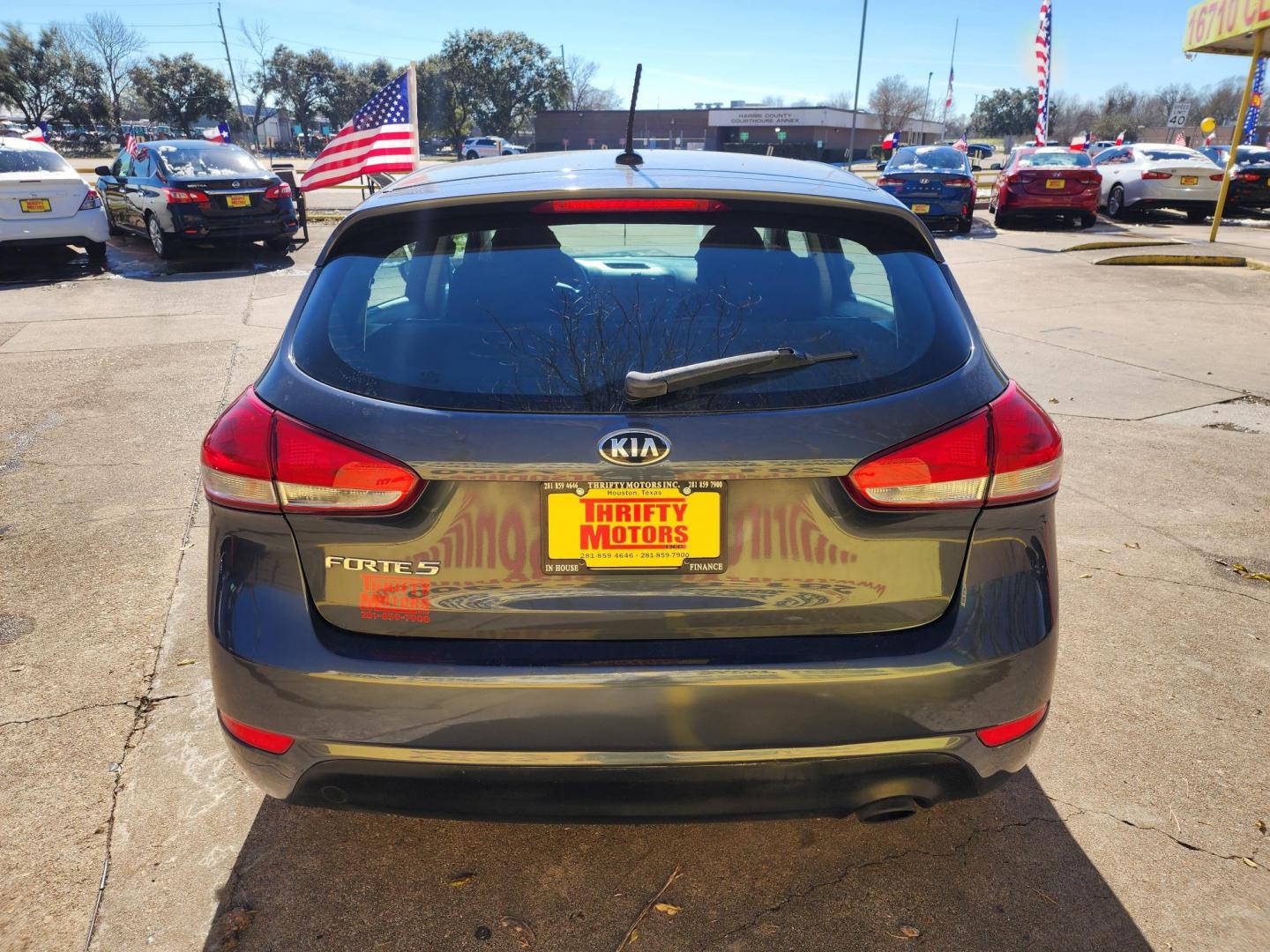 2016 Blue /Gray Kia Forte 5-Door LX (KNAFK5A80G5) with an 2.0L L4 DOHC 16V engine, Automatic 6-Speed transmission, located at 16710 Clay Rd., Houston, TX, 77084, (281) 859-7900, 29.834864, -95.656166 - Photo#5