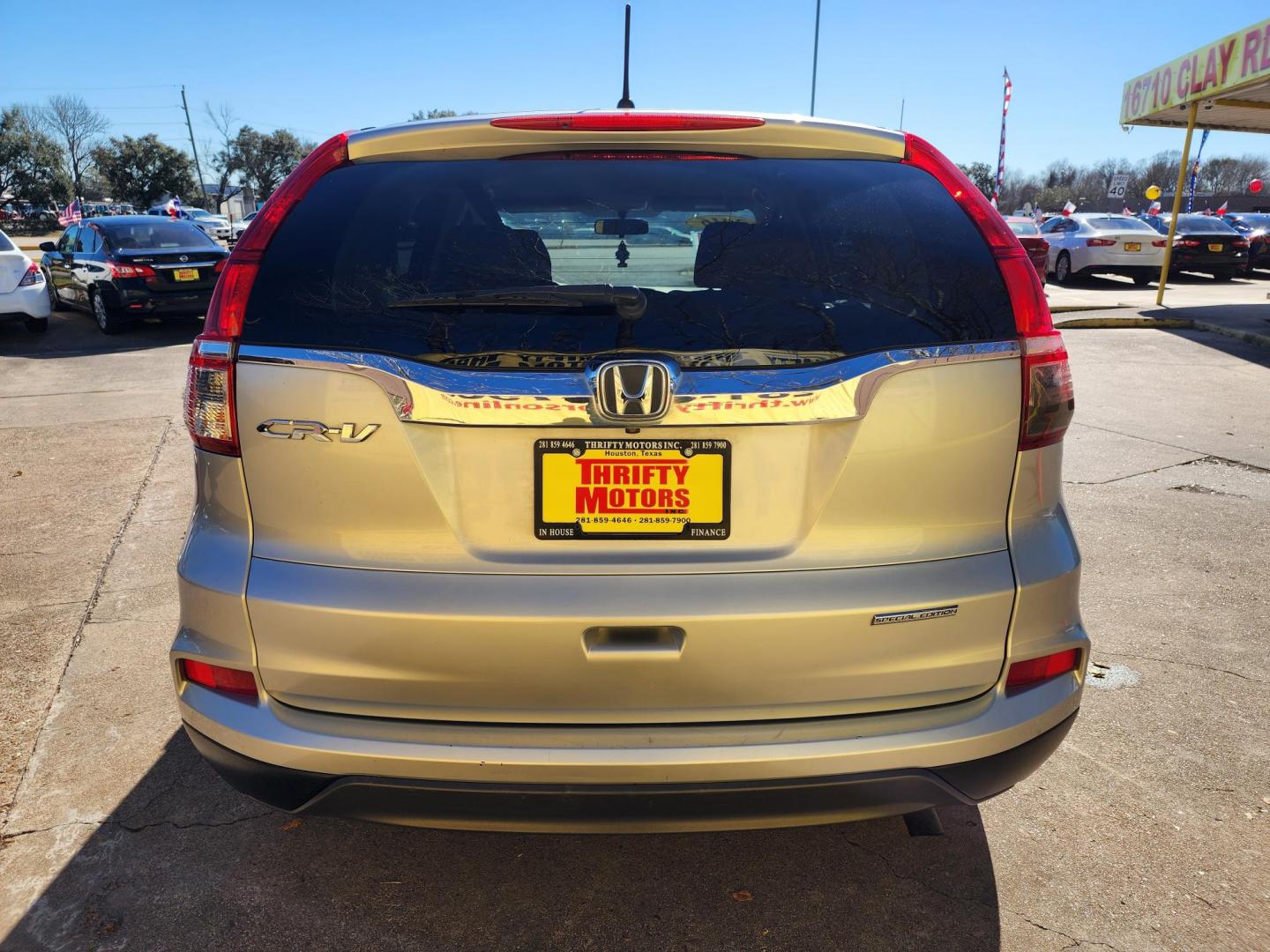 2016 Silver /Gray Honda CR-V SE 2WD (5J6RM3H45GL) with an 2.4L L4 DOHC 16V engine, CVT transmission, located at 16710 Clay Rd., Houston, TX, 77084, (281) 859-7900, 29.834864, -95.656166 - Photo#5