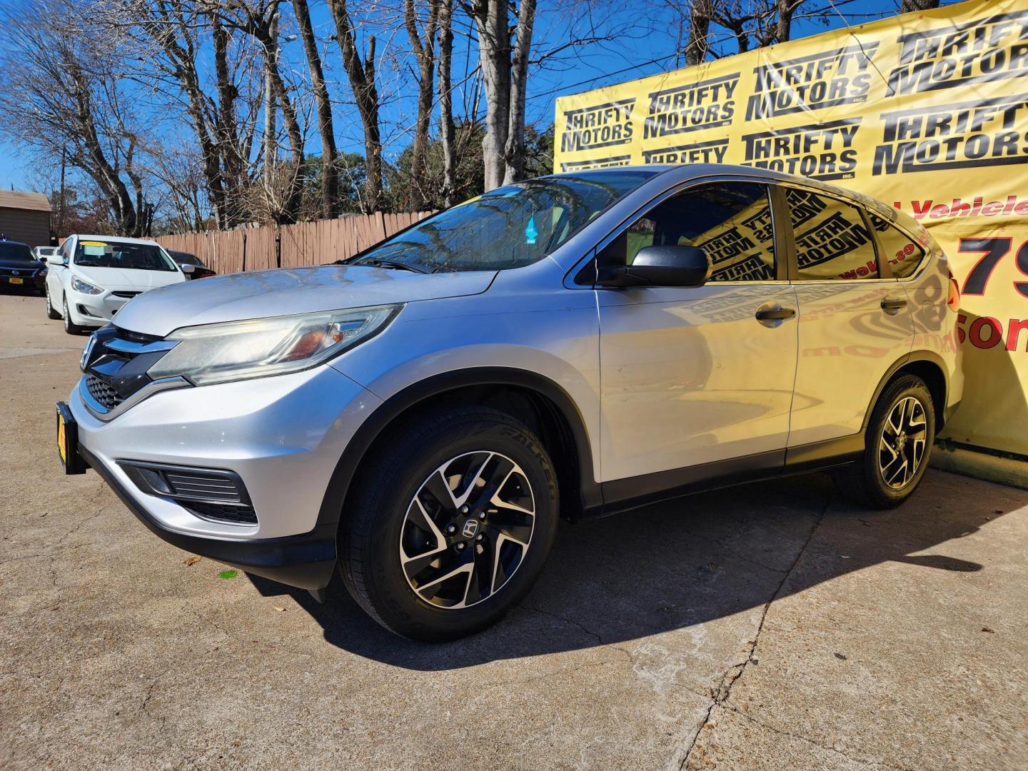 2016 Silver /Gray Honda CR-V SE 2WD (5J6RM3H45GL) with an 2.4L L4 DOHC 16V engine, CVT transmission, located at 16710 Clay Rd., Houston, TX, 77084, (281) 859-7900, 29.834864, -95.656166 - Photo#1