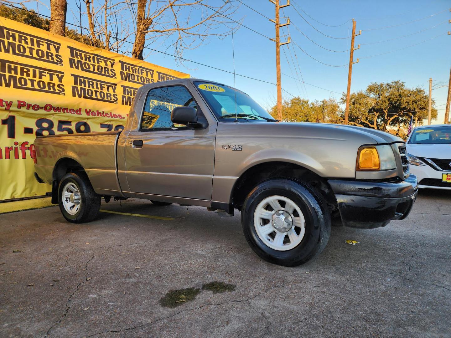 2003 Gold /Beige Ford Ranger XL Short Bed 2WD - 311A (1FTYR10D63P) with an 2.3L L4 SOHC 8V engine, Automatic 6-Speed transmission, located at 16710 Clay Rd., Houston, TX, 77084, (281) 859-7900, 29.834864, -95.656166 - Photo#2