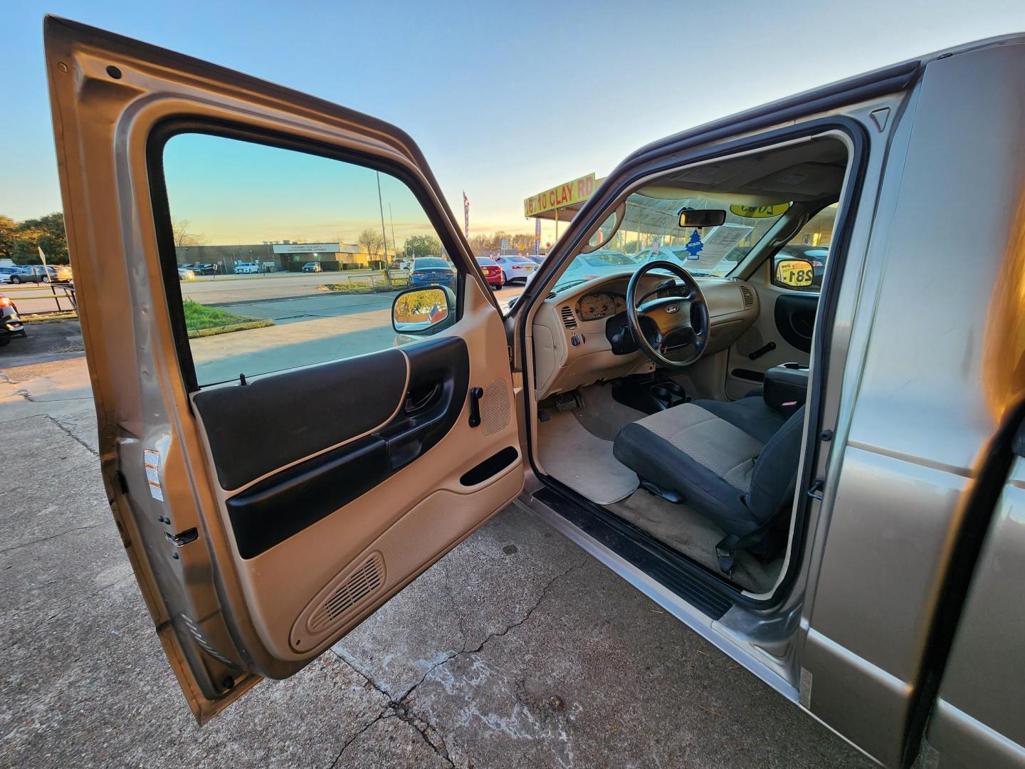 2003 Gold /Beige Ford Ranger XL Short Bed 2WD - 311A (1FTYR10D63P) with an 2.3L L4 SOHC 8V engine, Automatic 6-Speed transmission, located at 16710 Clay Rd., Houston, TX, 77084, (281) 859-7900, 29.834864, -95.656166 - Photo#6