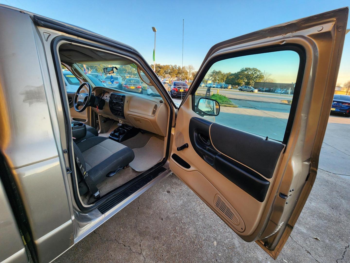 2003 Gold /Beige Ford Ranger XL Short Bed 2WD - 311A (1FTYR10D63P) with an 2.3L L4 SOHC 8V engine, Automatic 6-Speed transmission, located at 16710 Clay Rd., Houston, TX, 77084, (281) 859-7900, 29.834864, -95.656166 - Photo#8