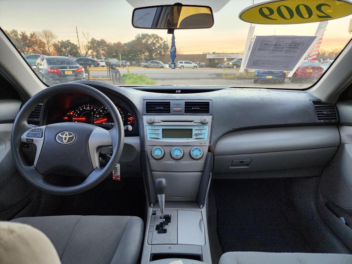 2009 Red /Gray Toyota Camry CE 5-Spd AT (4T4BE46K79R) with an 2.4L L4 DOHC 16V engine, Automatic 5-Speed transmission, located at 16710 Clay Rd., Houston, TX, 77084, (281) 859-7900, 29.834864, -95.656166 - Photo#11