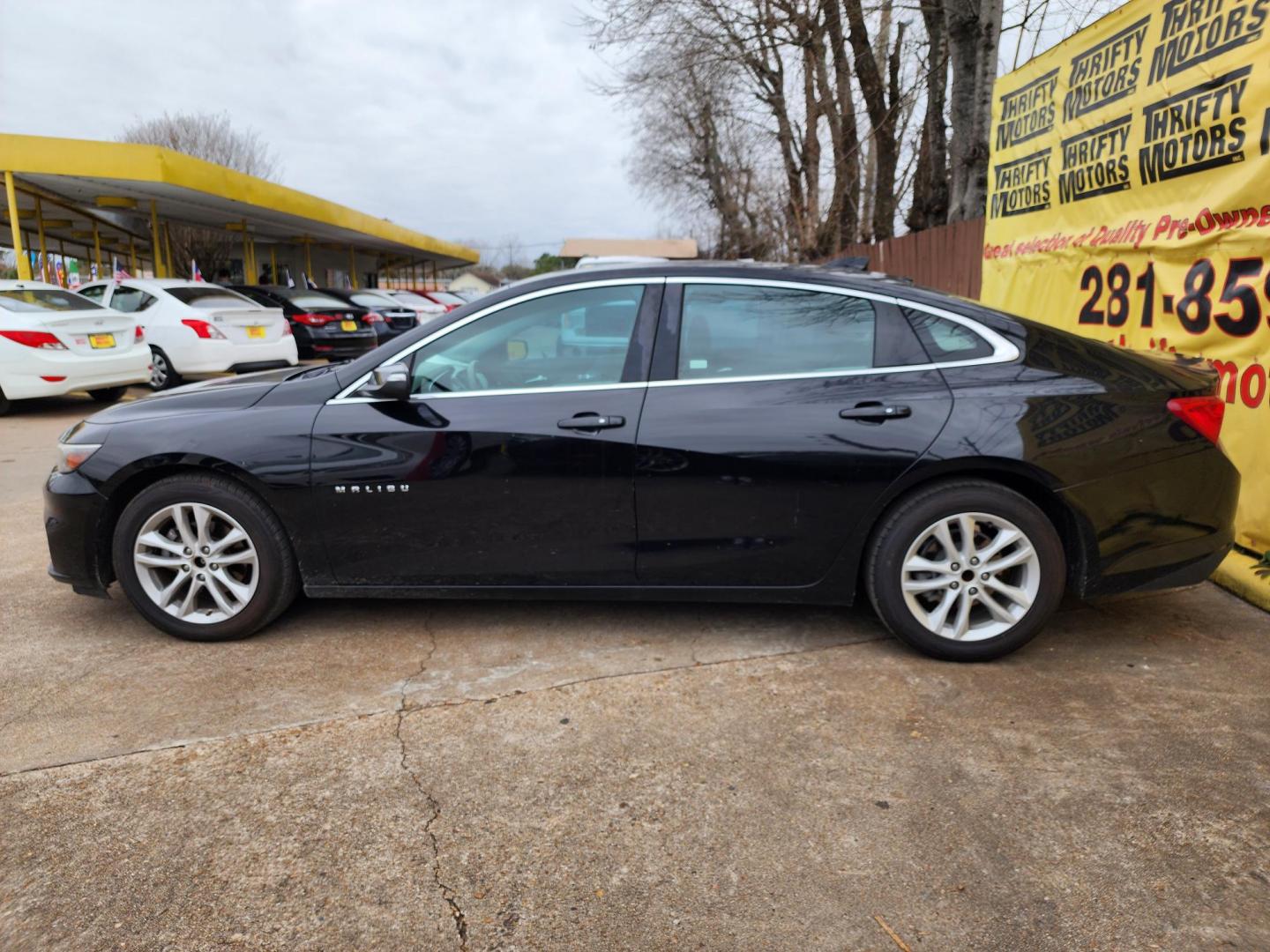 2018 Black /Gray Chevrolet Malibu LT (1G1ZD5ST1JF) with an 1.5L L4 DOHC 16V engine, 6A transmission, located at 16710 Clay Rd., Houston, TX, 77084, (281) 859-7900, 29.834864, -95.656166 - Photo#4