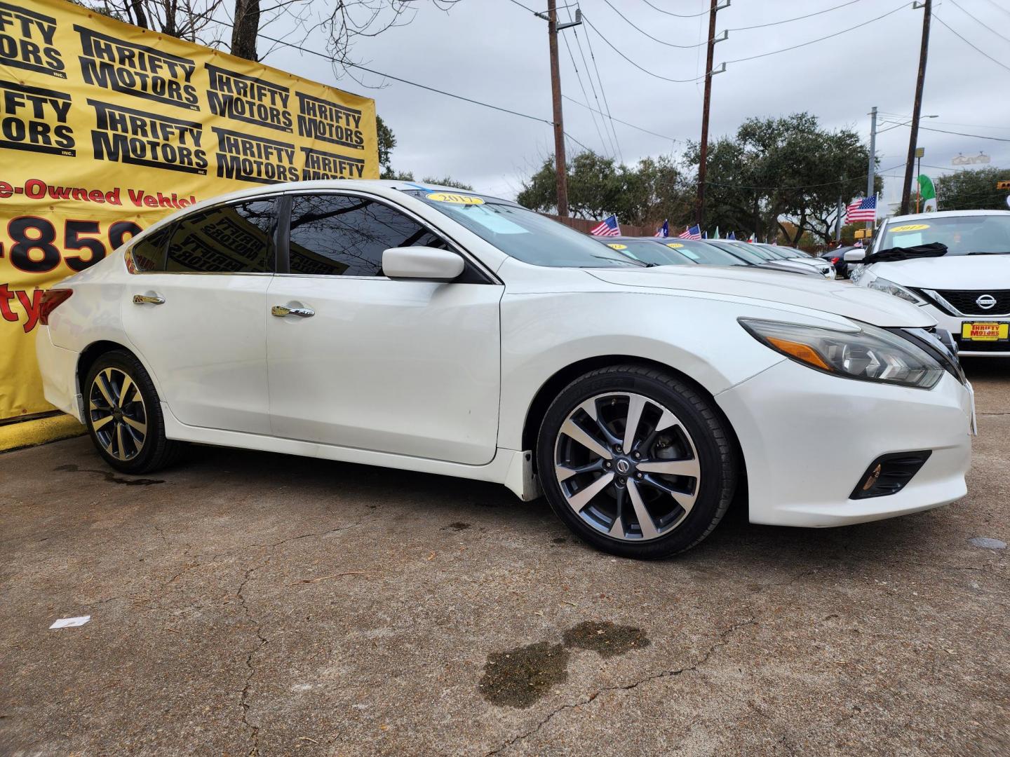 2017 White /Gray Nissan Altima 2.5 S (1N4AL3AP5HC) with an 2.5L L4 DOHC 16V engine, CVT transmission, located at 16710 Clay Rd., Houston, TX, 77084, (281) 859-7900, 29.834864, -95.656166 - Photo#2