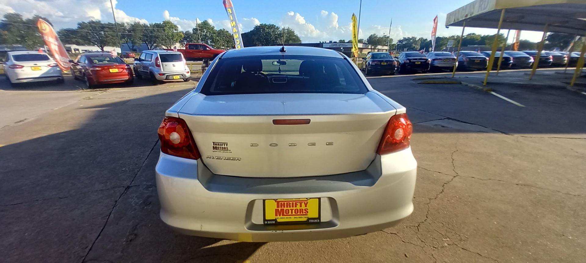 2012 Silver Dodge Avenger (1C3CDZAB4CN) with an 2.4L I4 2.4L I4 engine, Automatic 4-Speed transmission, located at 16710 Clay Rd., Houston, TX, 77084, (281) 859-7900, 29.834864, -95.656166 - Low Down. Low Payments. - Photo#5