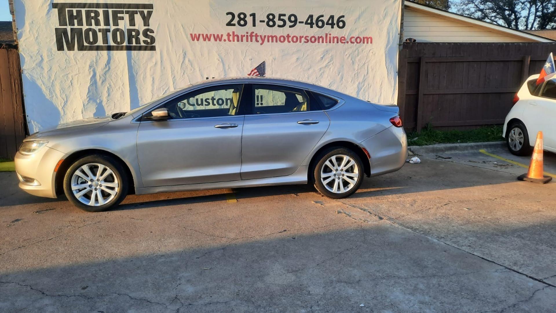 2015 Gray Chrysler 200 (1C3CCCAB5FN) with an 2.4L I4 2.4L I4 engine, Automatic 9-Speed transmission, located at 16710 Clay Rd., Houston, TX, 77084, (281) 859-7900, 29.834864, -95.656166 - Low Down. Low Payments. - Photo#0