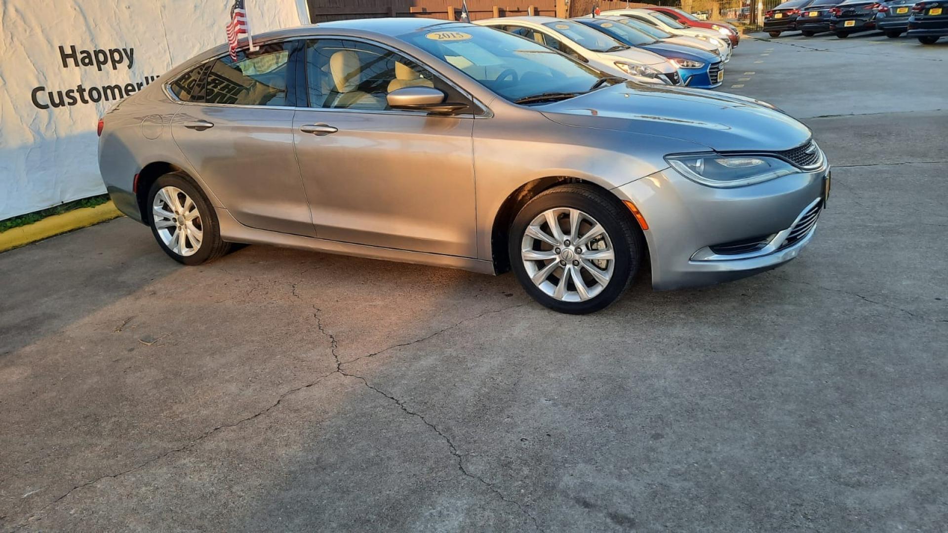 2015 Gray Chrysler 200 (1C3CCCAB5FN) with an 2.4L I4 2.4L I4 engine, Automatic 9-Speed transmission, located at 16710 Clay Rd., Houston, TX, 77084, (281) 859-7900, 29.834864, -95.656166 - Low Down. Low Payments. - Photo#2