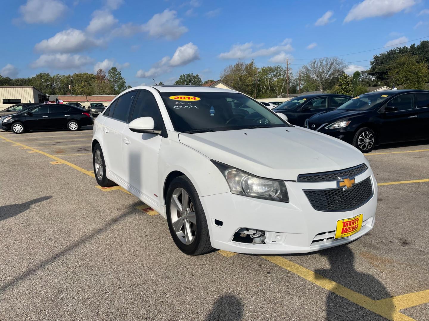 2014 White Chevrolet Cruze (1G1PE5SB2E7) with an 1.4L I4 Turbocharger 1.4L I4 engine, Automatic 6-Speed transmission, located at 16710 Clay Rd., Houston, TX, 77084, (281) 859-7900, 29.834864, -95.656166 - Low Down. Low Payments. - Photo#2