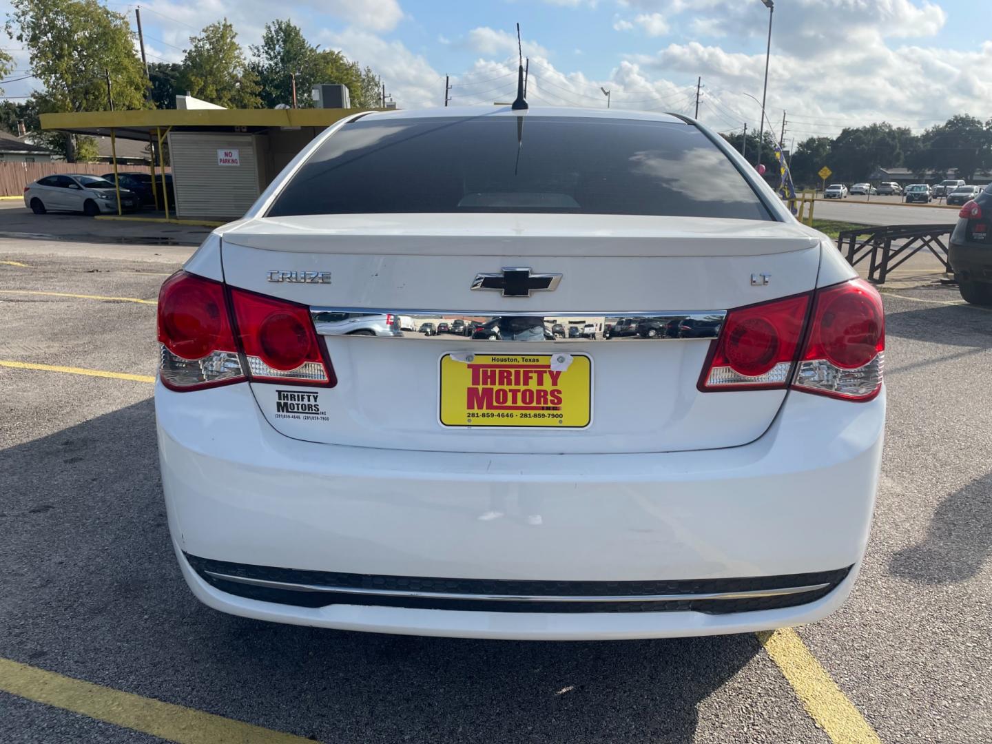 2014 White Chevrolet Cruze (1G1PE5SB2E7) with an 1.4L I4 Turbocharger 1.4L I4 engine, Automatic 6-Speed transmission, located at 16710 Clay Rd., Houston, TX, 77084, (281) 859-7900, 29.834864, -95.656166 - Low Down. Low Payments. - Photo#3