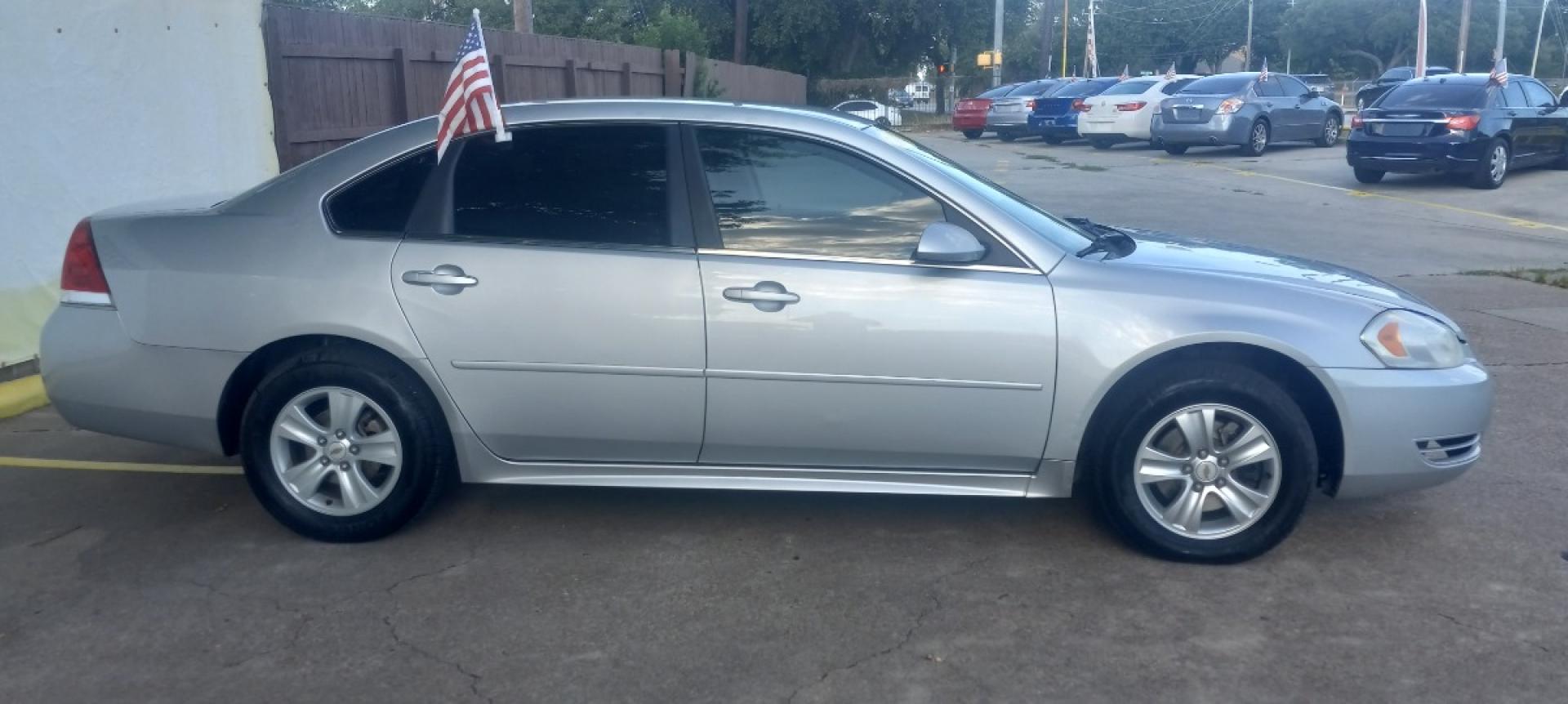 2014 Silver Chevrolet Impala Limited (2G1WA5E32E1) with an 3.6L V6 3.6L V6 engine, Automatic 6-Speed transmission, located at 16710 Clay Rd., Houston, TX, 77084, (281) 859-7900, 29.834864, -95.656166 - Cash. - Photo#4