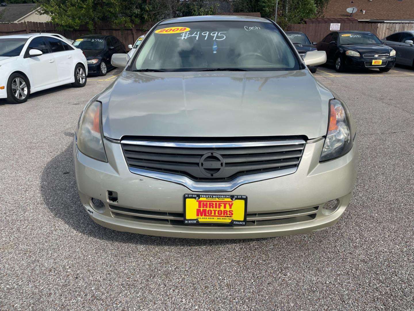 2009 Gold Nissan Altima (1N4AL21E39N) with an 2.5L I4 2.5L I4 engine, CVT transmission, located at 16710 Clay Rd., Houston, TX, 77084, (281) 859-7900, 29.834864, -95.656166 - Photo#0