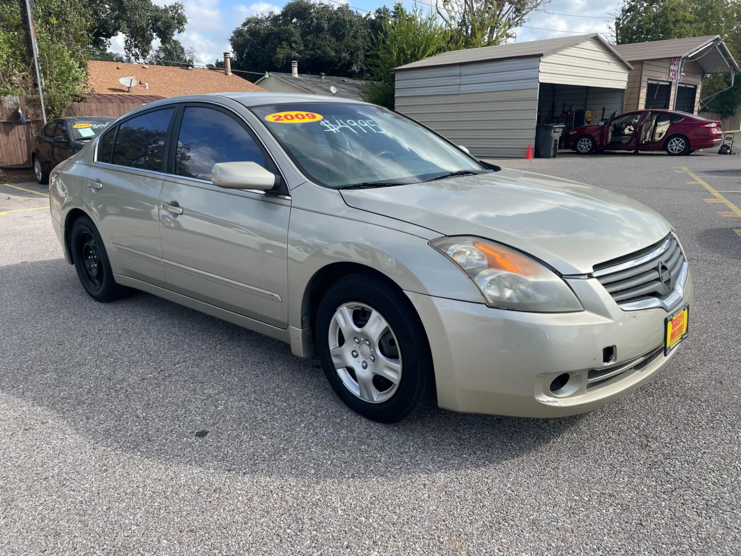 2009 Gold Nissan Altima (1N4AL21E39N) with an 2.5L I4 2.5L I4 engine, CVT transmission, located at 16710 Clay Rd., Houston, TX, 77084, (281) 859-7900, 29.834864, -95.656166 - Photo#1