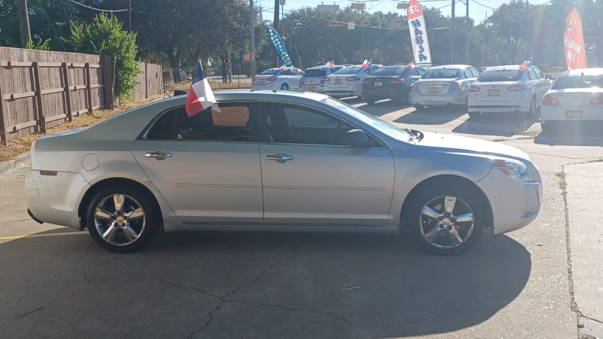 2012 Silver Chevrolet Malibu (1G1ZD5EU6CF) with an 2.4L I4 2.4L I4 engine, Automatic 6-Speed transmission, located at 16710 Clay Rd., Houston, TX, 77084, (281) 859-7900, 29.834864, -95.656166 - Cash. - Photo#4