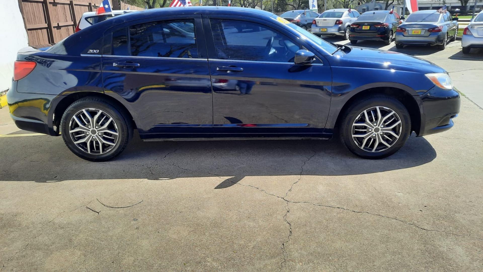 2014 Blue Chrysler 200 (1C3CCBAB6EN) with an 2.4L I4 2.4L I4 engine, Automatic 6-Speed transmission, located at 16710 Clay Rd., Houston, TX, 77084, (281) 859-7900, 29.834864, -95.656166 - Low Down. Low Payments. - Photo#1