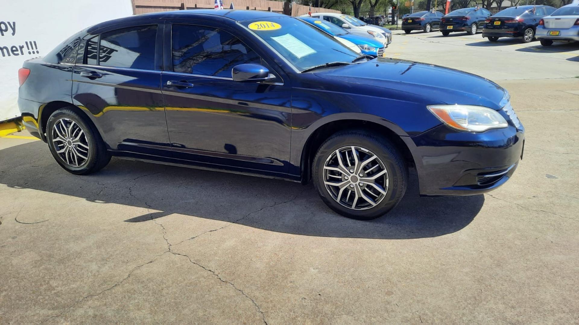 2014 Blue Chrysler 200 (1C3CCBAB6EN) with an 2.4L I4 2.4L I4 engine, Automatic 6-Speed transmission, located at 16710 Clay Rd., Houston, TX, 77084, (281) 859-7900, 29.834864, -95.656166 - Low Down. Low Payments. - Photo#2