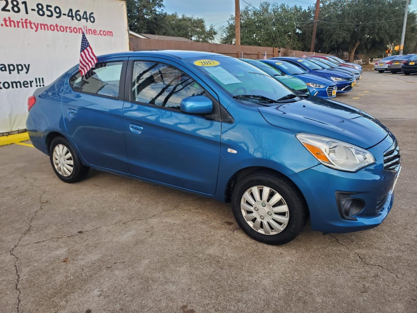 2017 Blue Mitsubishi Mirage G4 (ML32F3FJ5HH) with an 1.2L I3 1.2L I3 engine, Manual 5-Speed transmission, located at 16710 Clay Rd., Houston, TX, 77084, (281) 859-7900, 29.834864, -95.656166 - Photo#2