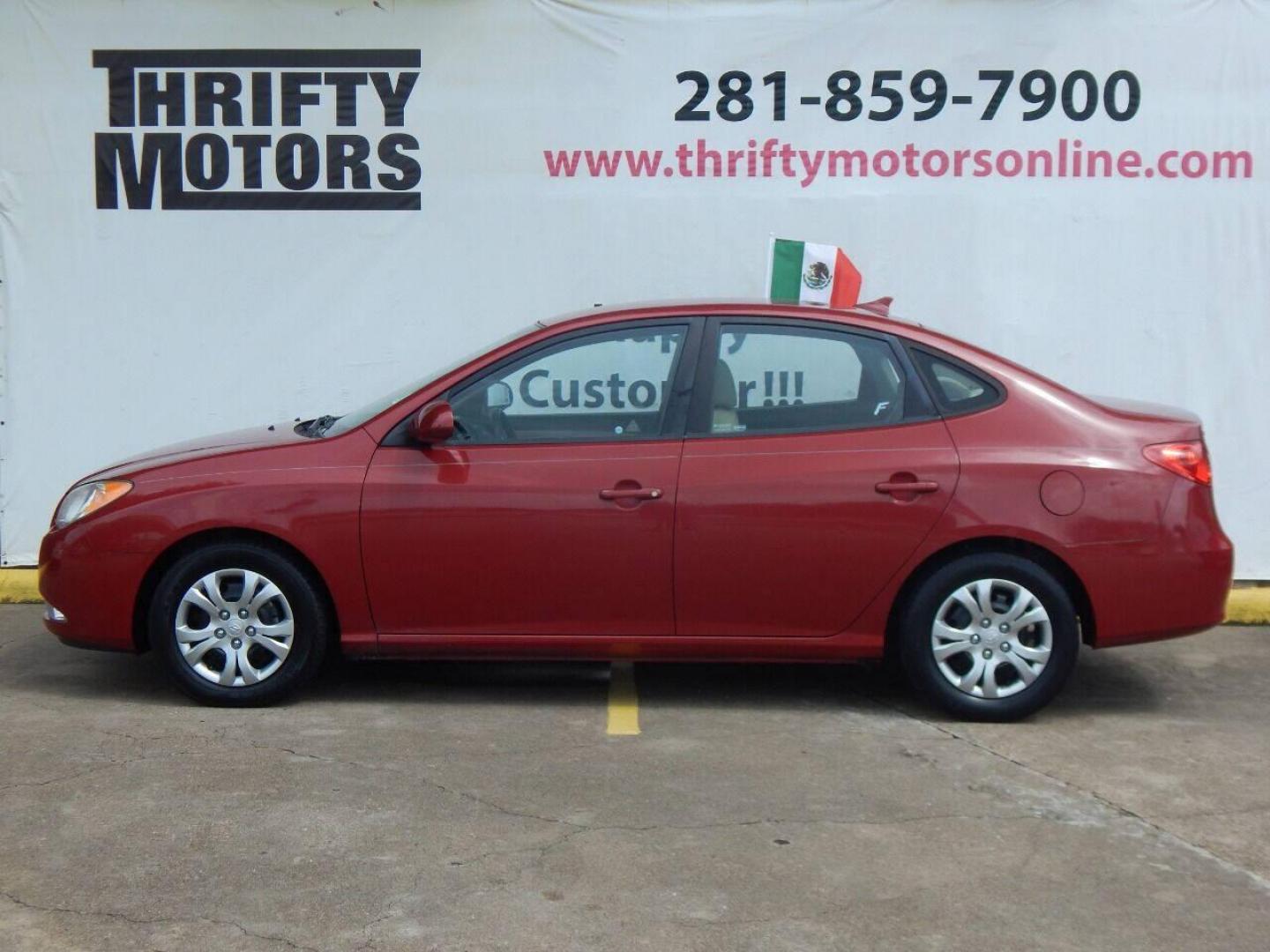 2010 Red Hyundai Elantra (KMHDU4AD7AU) with an 2.0L I4 2.0L I4 engine, Automatic 4-Speed transmission, located at 16710 Clay Rd., Houston, TX, 77084, (281) 859-7900, 29.834864, -95.656166 - Low Down. Low Payments. - Photo#0