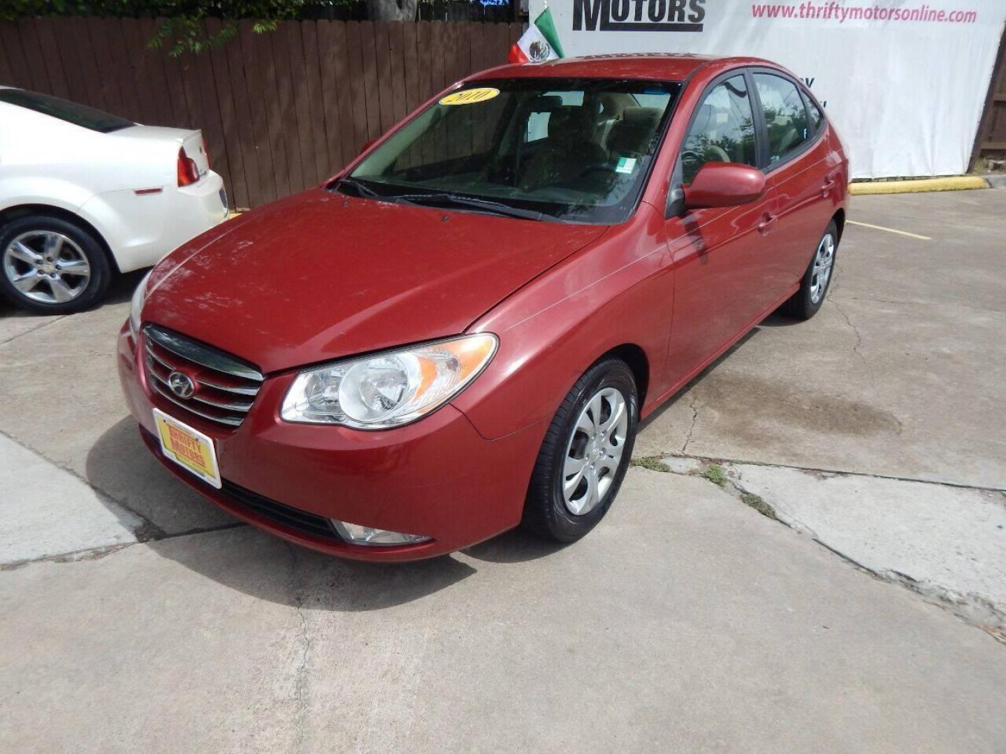 2010 Red Hyundai Elantra (KMHDU4AD7AU) with an 2.0L I4 2.0L I4 engine, Automatic 4-Speed transmission, located at 16710 Clay Rd., Houston, TX, 77084, (281) 859-7900, 29.834864, -95.656166 - Low Down. Low Payments. - Photo#1