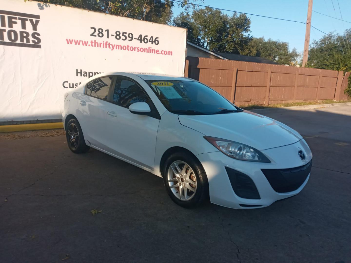 2011 /BLACK Mazda MAZDA3 i Sport 4-Door (JM1BL1UG5B1) with an 2.0L L4 DOHC 16V engine, located at 16710 Clay Rd., Houston, TX, 77084, (281) 859-7900, 29.834864, -95.656166 - Low Down. Low Payments. - Photo#3