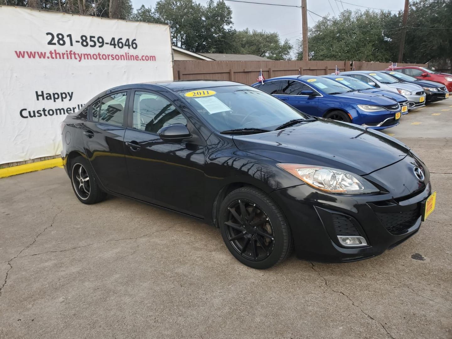 2011 Black Mazda MAZDA3 s Sport 4-Door (JM1BL1U65B1) with an 2.5L L4 DOHC 16V engine, located at 16710 Clay Rd., Houston, TX, 77084, (281) 859-7900, 29.834864, -95.656166 - Low Down. Low Payments - Photo#3