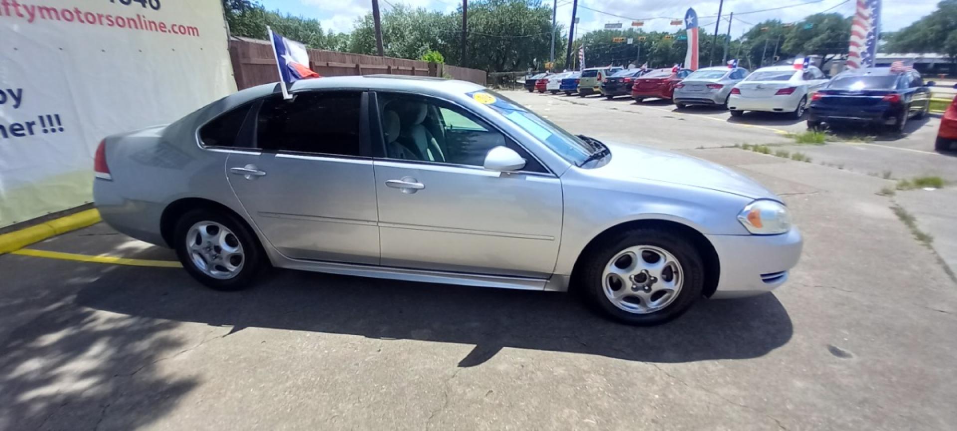 2014 Silver Chevrolet Impala LT (2G1WB5E31E1) with an 3.6L V6 DOHC 16V FFV engine, 6-Speed Automatic transmission, located at 16710 Clay Rd., Houston, TX, 77084, (281) 859-7900, 29.834864, -95.656166 - Photo#3