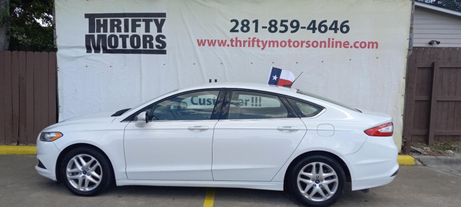 2016 White Ford Fusion SE (3FA6P0H74GR) with an 2.5L L4 DOHC 16V engine, 6-Speed Automatic transmission, located at 16710 Clay Rd., Houston, TX, 77084, (281) 859-7900, 29.834864, -95.656166 - Low Down. Low Payments. - Photo#0