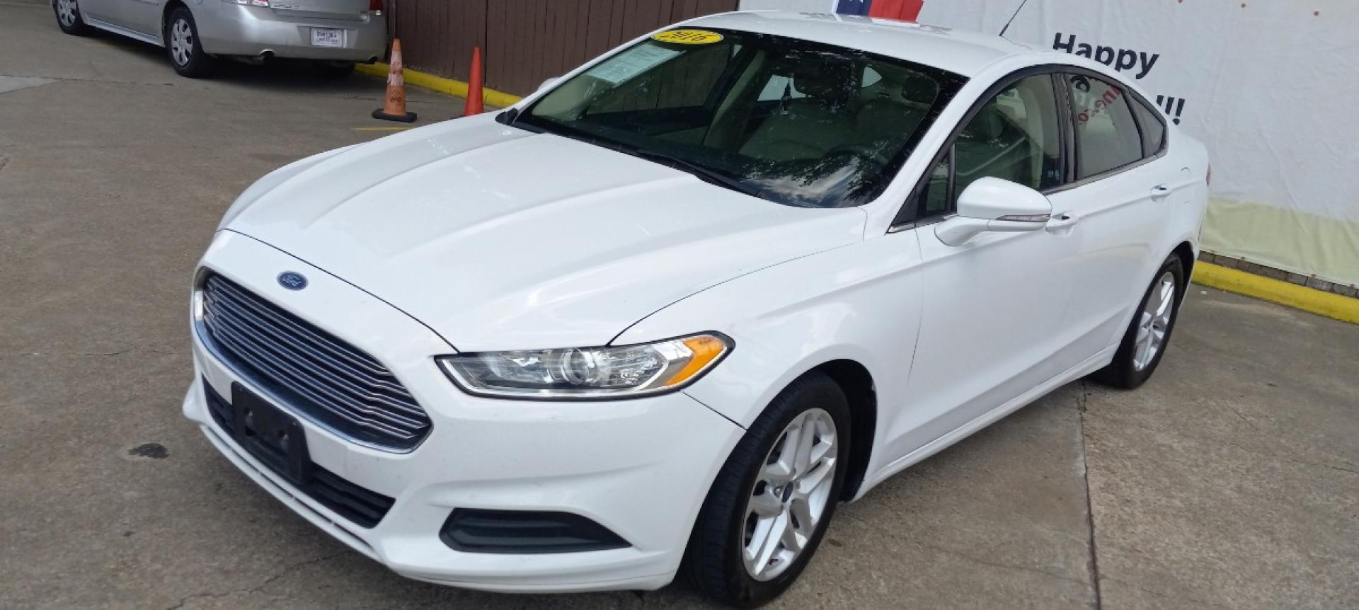 2016 White Ford Fusion SE (3FA6P0H74GR) with an 2.5L L4 DOHC 16V engine, 6-Speed Automatic transmission, located at 16710 Clay Rd., Houston, TX, 77084, (281) 859-7900, 29.834864, -95.656166 - Low Down. Low Payments. - Photo#2