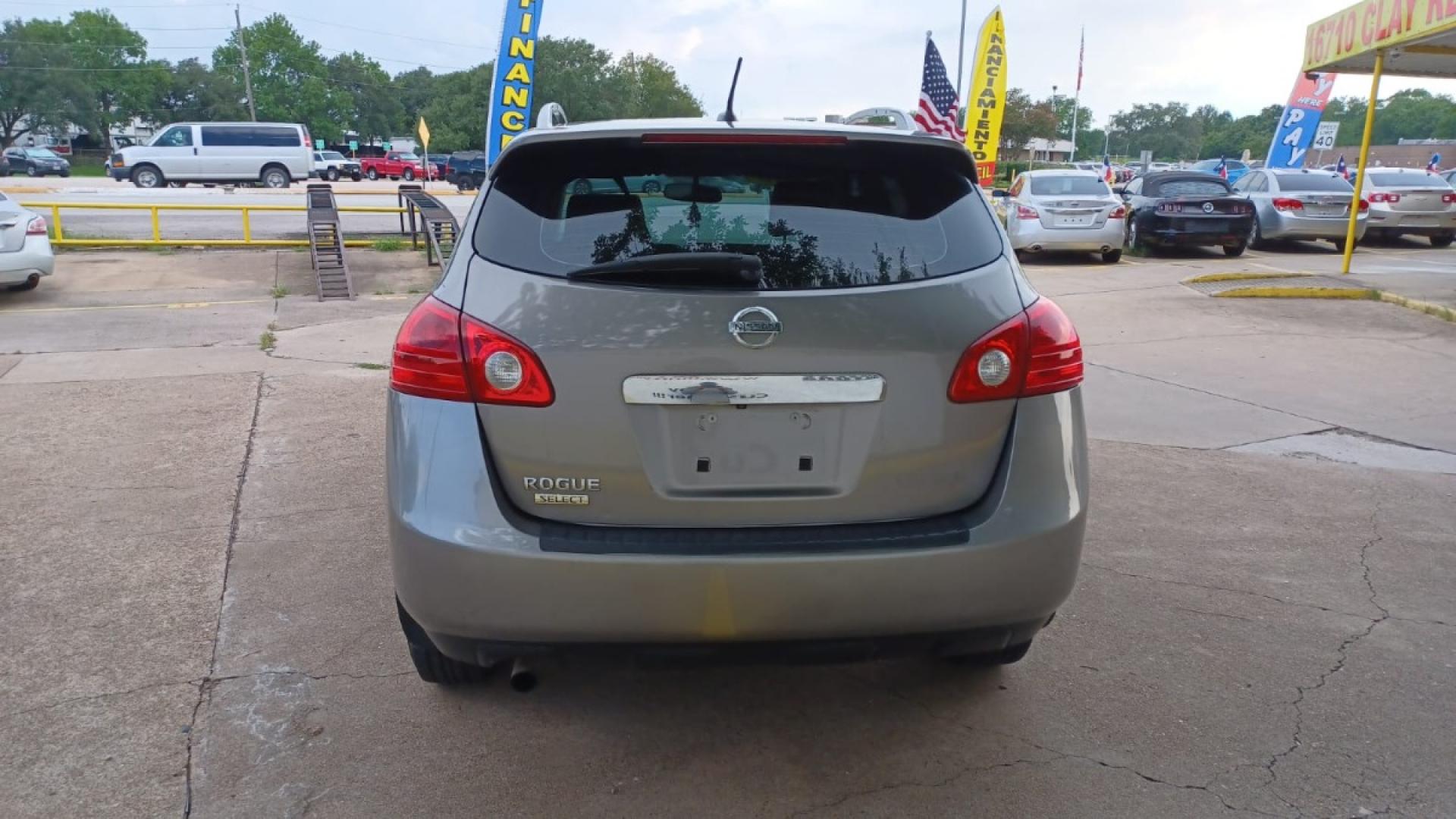 2015 Brown Nissan Rogue Select S 2WD (JN8AS5MT5FW) with an 2.5L L4 DOHC 16V engine, Continuously Variable Transmission transmission, located at 16710 Clay Rd., Houston, TX, 77084, (281) 859-7900, 29.834864, -95.656166 - Low Down. Low Payments. - Photo#5