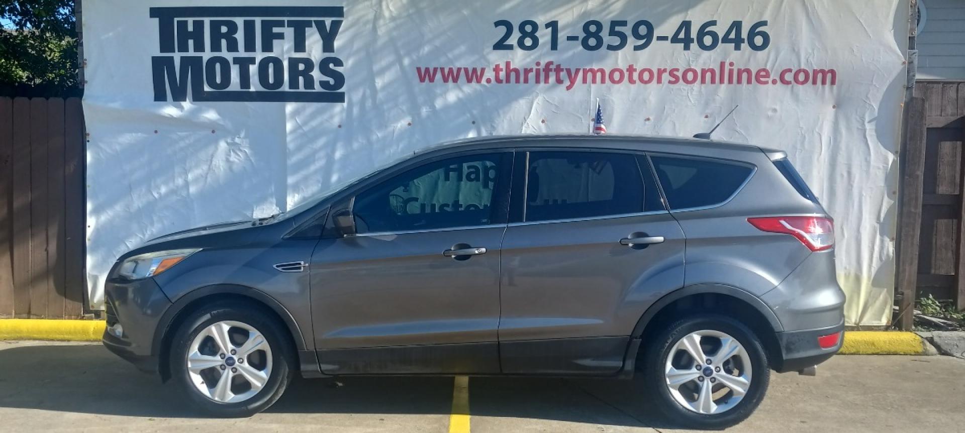 2013 Gray Ford Escape SE FWD (1FMCU0GX6DU) with an 1.6L L4 DOHC 16V engine, 6-Speed Automatic transmission, located at 16710 Clay Rd., Houston, TX, 77084, (281) 859-7900, 29.834864, -95.656166 - Low Down. Low Payments. - Photo#0