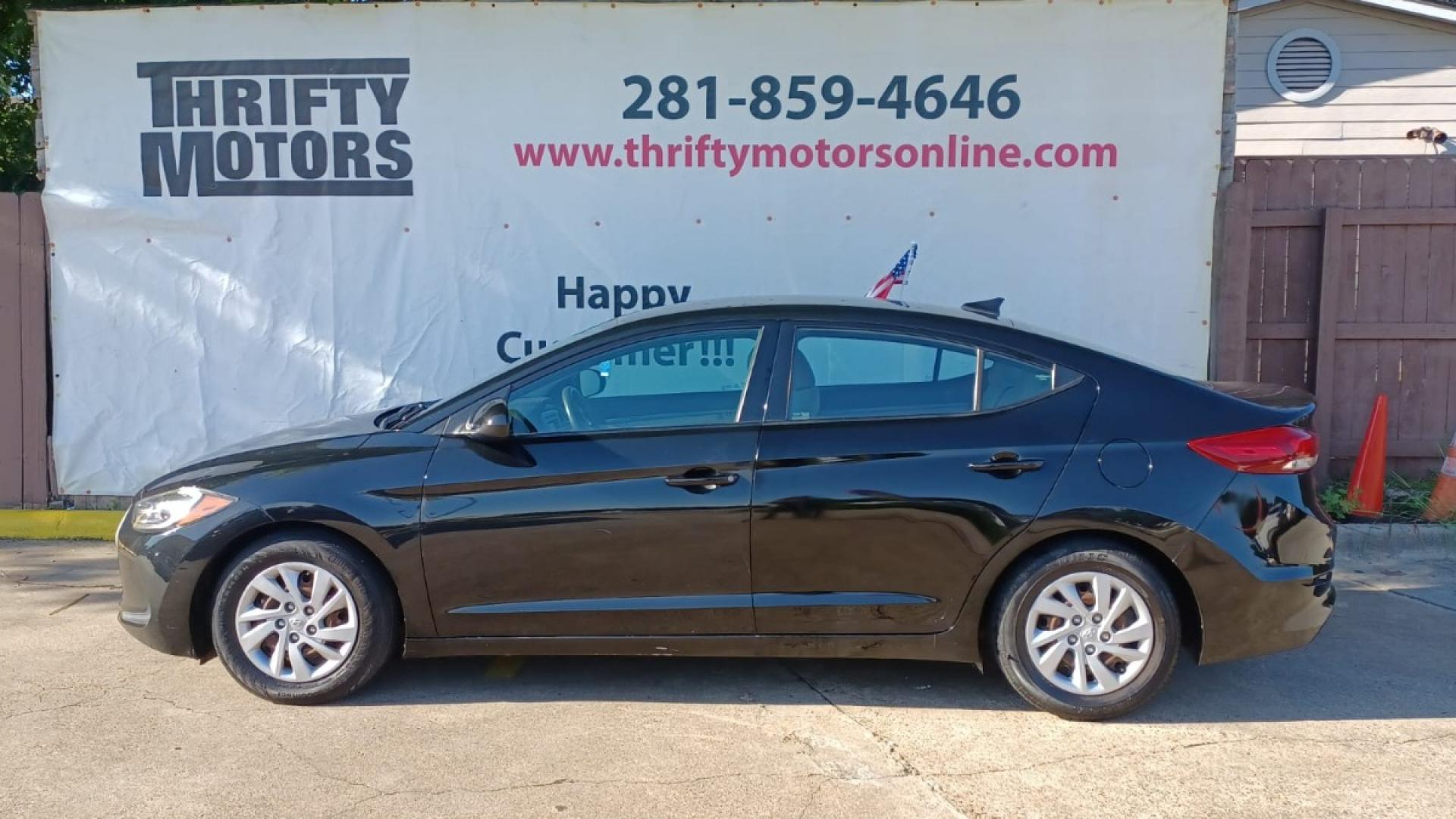 2017 Black Hyundai Elantra SE 6AT (5NPD74LFXHH) with an 1.8L L4 DOHC 16V engine, 6A transmission, located at 16710 Clay Rd., Houston, TX, 77084, (281) 859-7900, 29.834864, -95.656166 - Low Down. Low Payments. - Photo#0