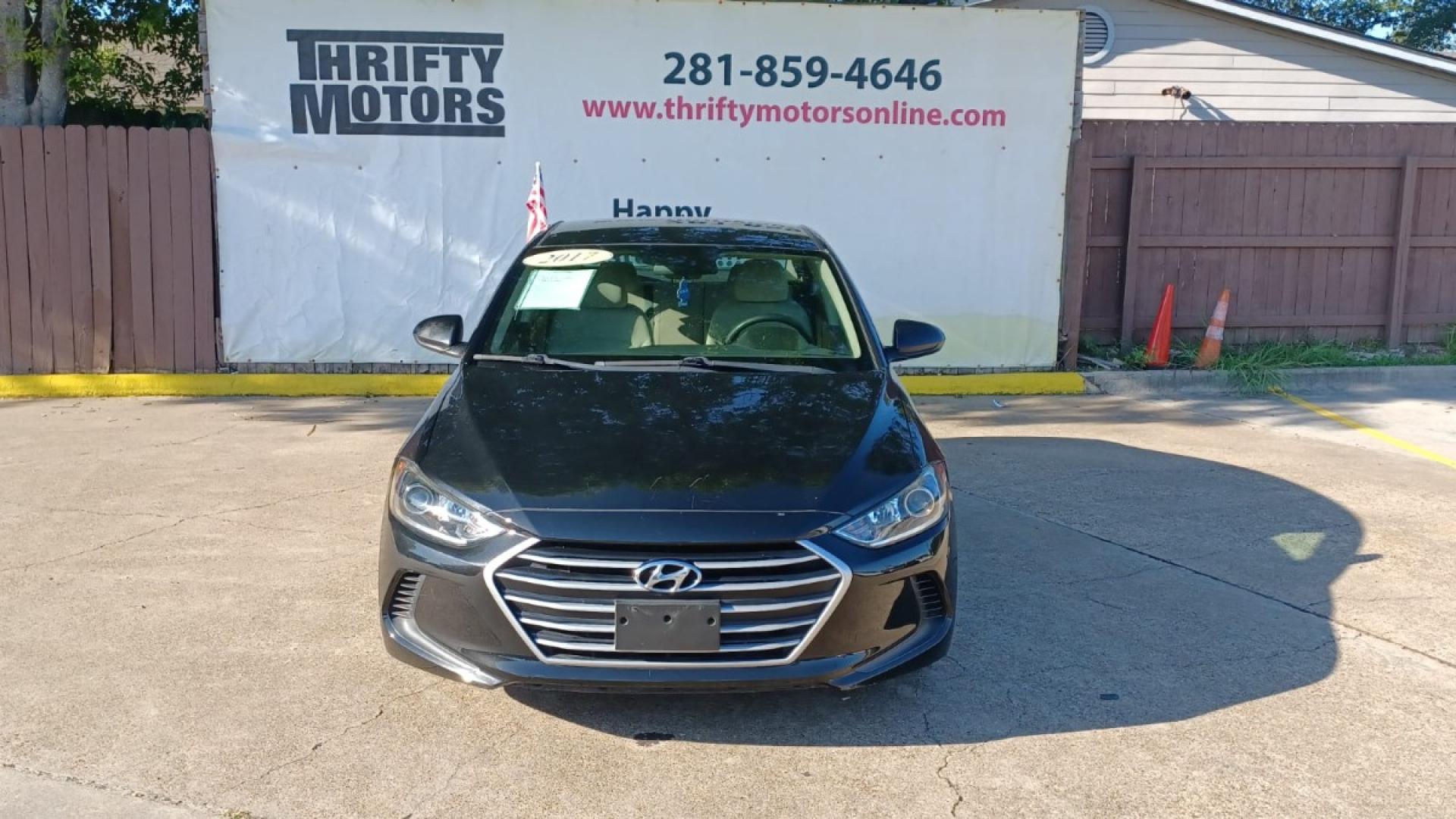 2017 Black Hyundai Elantra SE 6AT (5NPD74LFXHH) with an 1.8L L4 DOHC 16V engine, 6A transmission, located at 16710 Clay Rd., Houston, TX, 77084, (281) 859-7900, 29.834864, -95.656166 - Low Down. Low Payments. - Photo#1