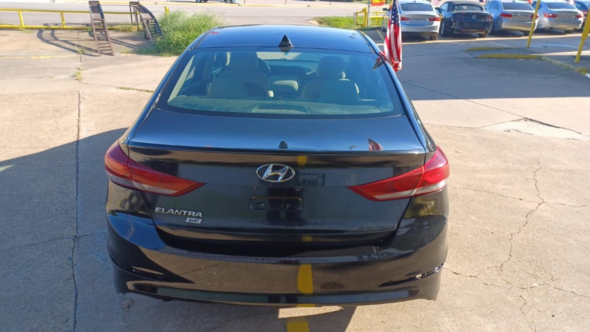 2017 Black Hyundai Elantra SE 6AT (5NPD74LFXHH) with an 1.8L L4 DOHC 16V engine, 6A transmission, located at 16710 Clay Rd., Houston, TX, 77084, (281) 859-7900, 29.834864, -95.656166 - Low Down. Low Payments. - Photo#5