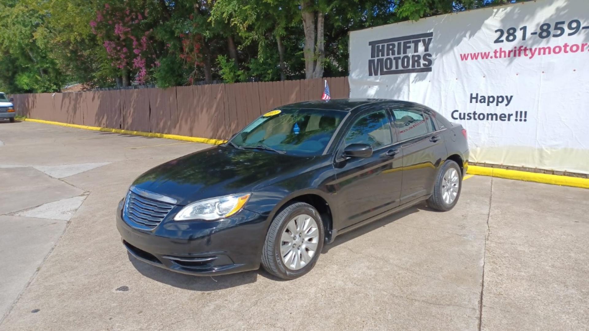 2013 Black Chrysler 200 LX (1C3CCBAB2DN) with an 2.4L L4 DOHC 16V engine, 6-Speed Automatic transmission, located at 16710 Clay Rd., Houston, TX, 77084, (281) 859-7900, 29.834864, -95.656166 - Low Down. Low Payments. - Photo#2