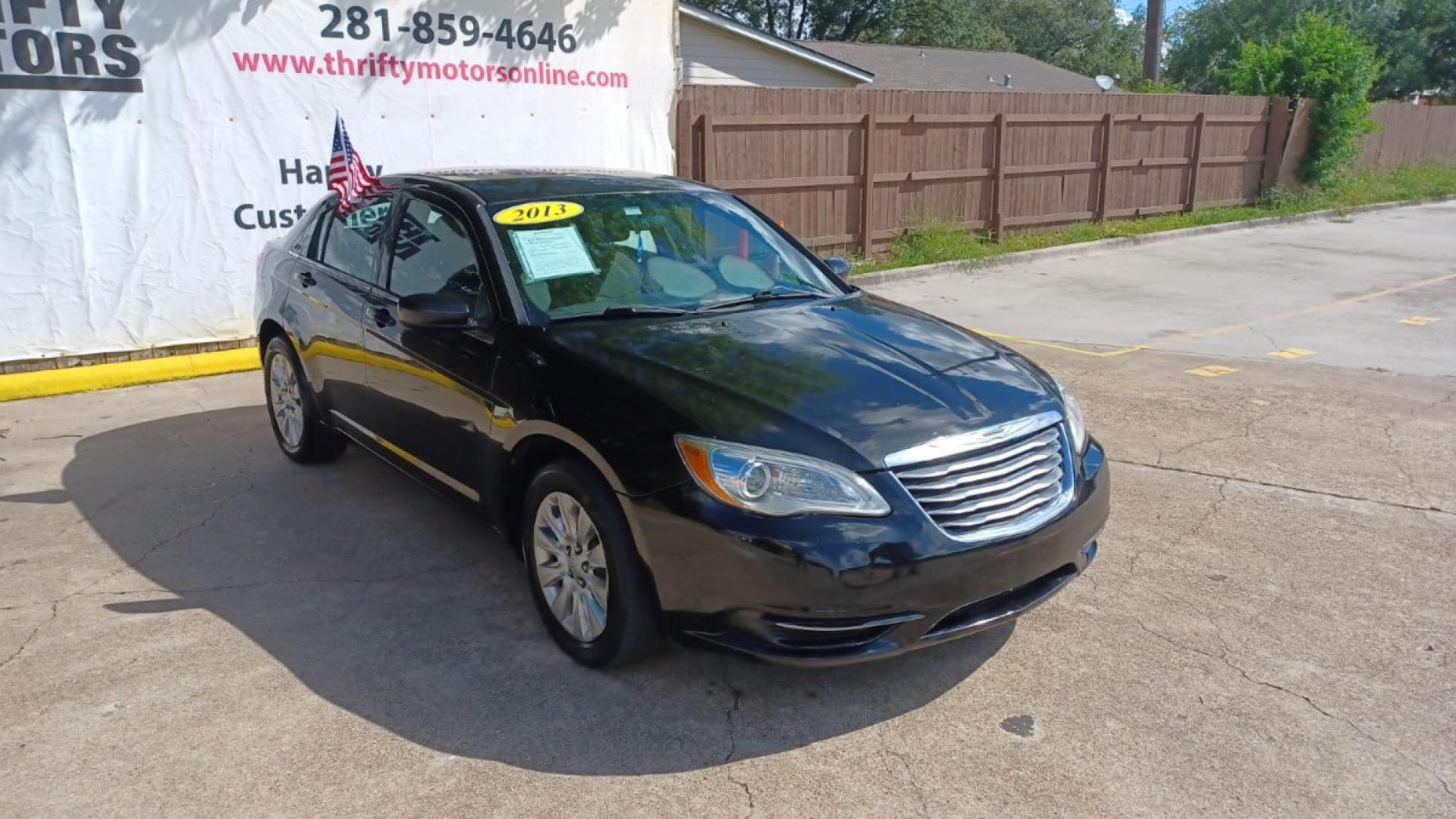 2013 Black Chrysler 200 LX (1C3CCBAB2DN) with an 2.4L L4 DOHC 16V engine, 6-Speed Automatic transmission, located at 16710 Clay Rd., Houston, TX, 77084, (281) 859-7900, 29.834864, -95.656166 - Low Down. Low Payments. - Photo#3