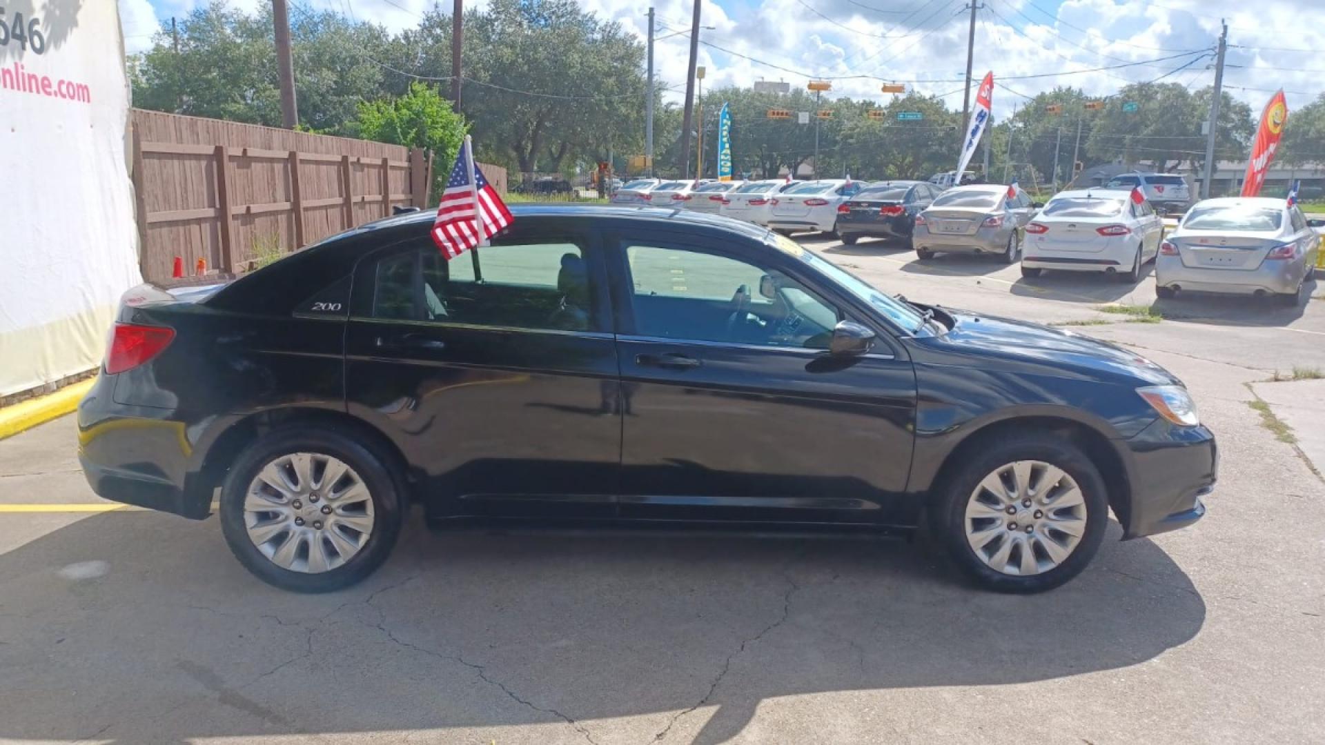 2013 Black Chrysler 200 LX (1C3CCBAB2DN) with an 2.4L L4 DOHC 16V engine, 6-Speed Automatic transmission, located at 16710 Clay Rd., Houston, TX, 77084, (281) 859-7900, 29.834864, -95.656166 - Low Down. Low Payments. - Photo#4