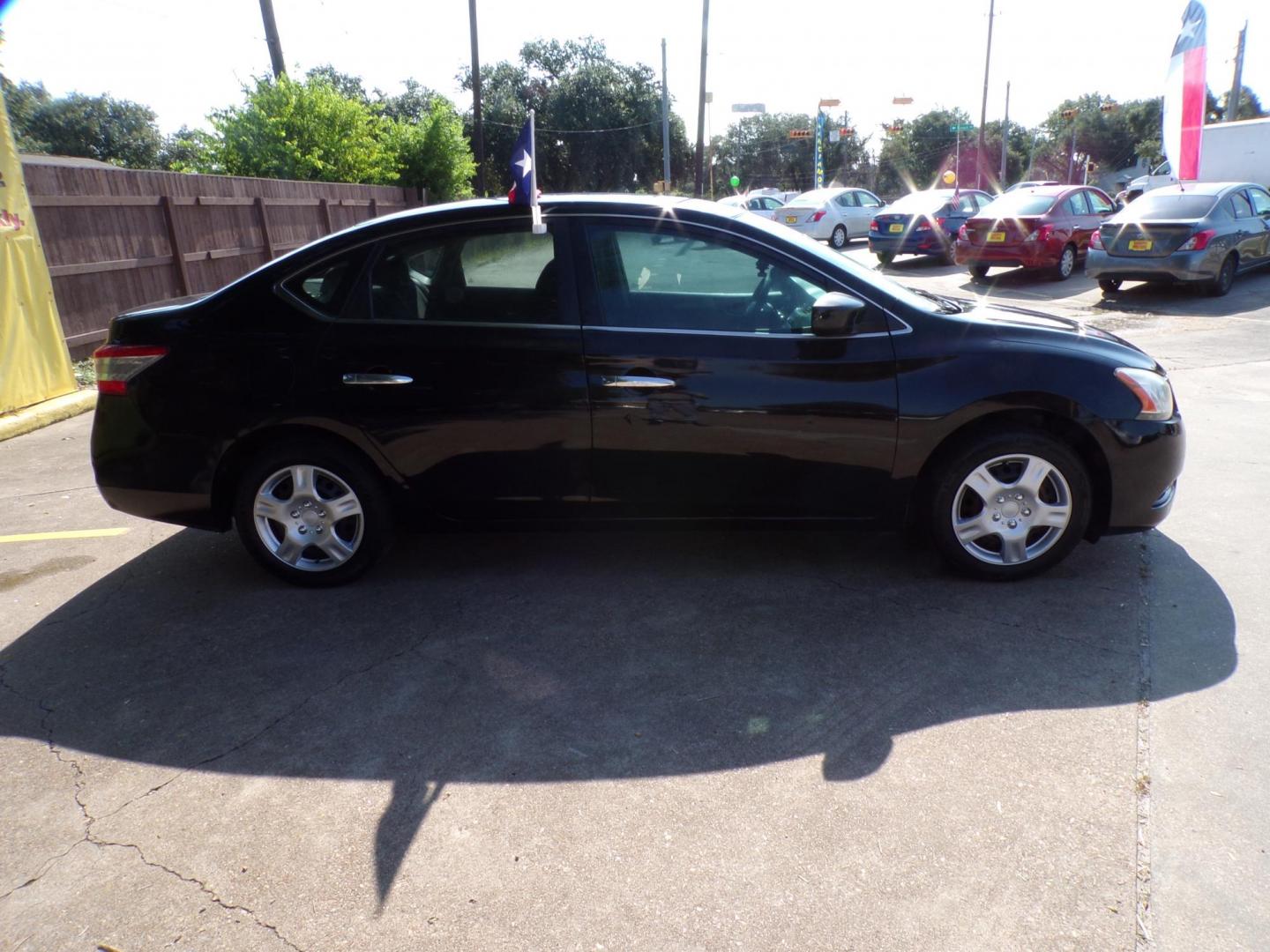 2015 Black Nissan Sentra (3N1AB7AP3DL) with an 1.8L I4 1.8L I4 engine, Manual 6-Speed transmission, located at 16710 Clay Rd., Houston, TX, 77084, (281) 859-7900, 29.834864, -95.656166 - Photo#1