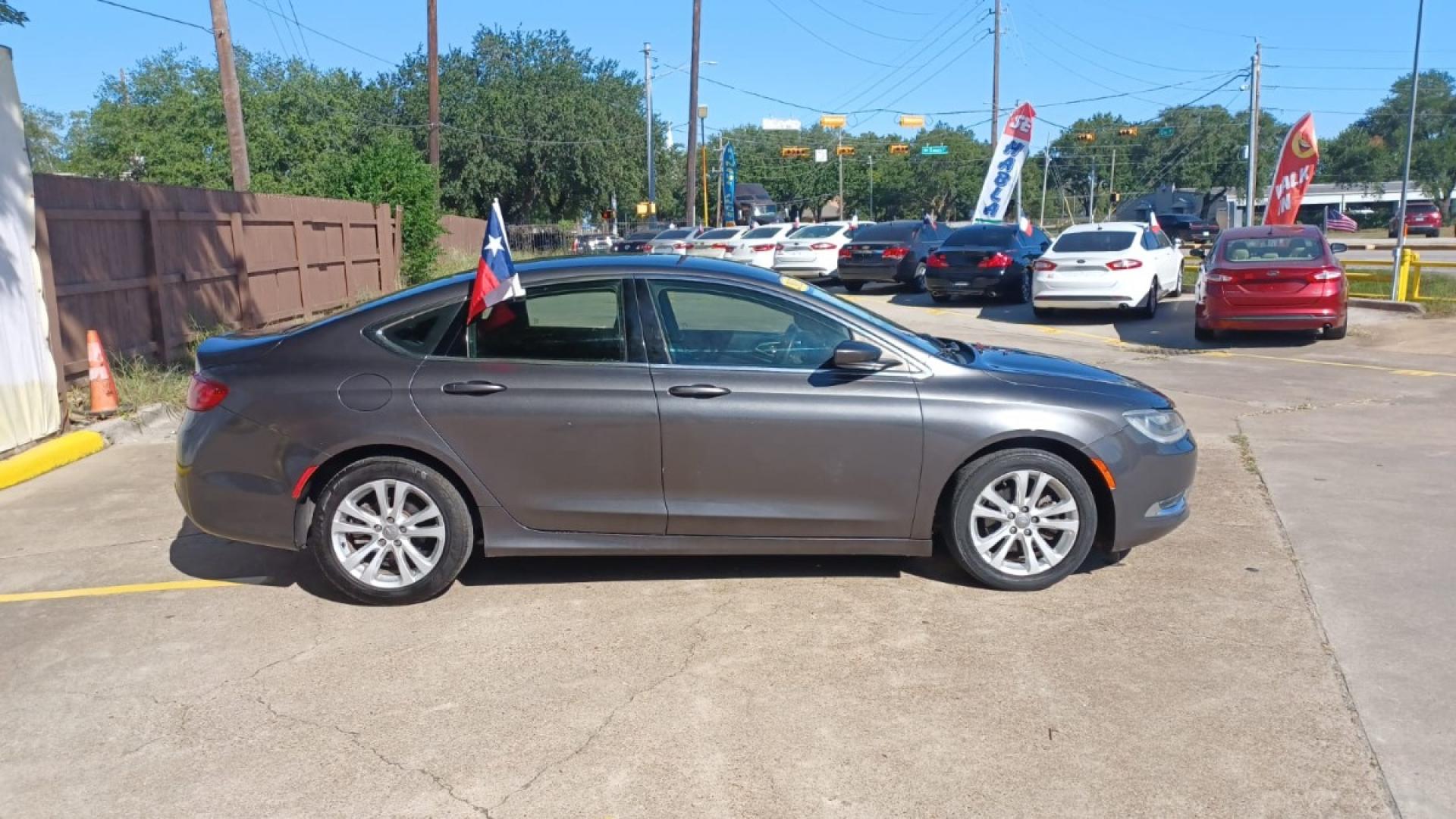 2015 Gray Chrysler 200 Limited (1C3CCCAB5FN) with an 2.4L L4 DOHC 16V engine, 9-Speed Automatic transmission, located at 16710 Clay Rd., Houston, TX, 77084, (281) 859-7900, 29.834864, -95.656166 - Low Down. Low Payments. - Photo#4