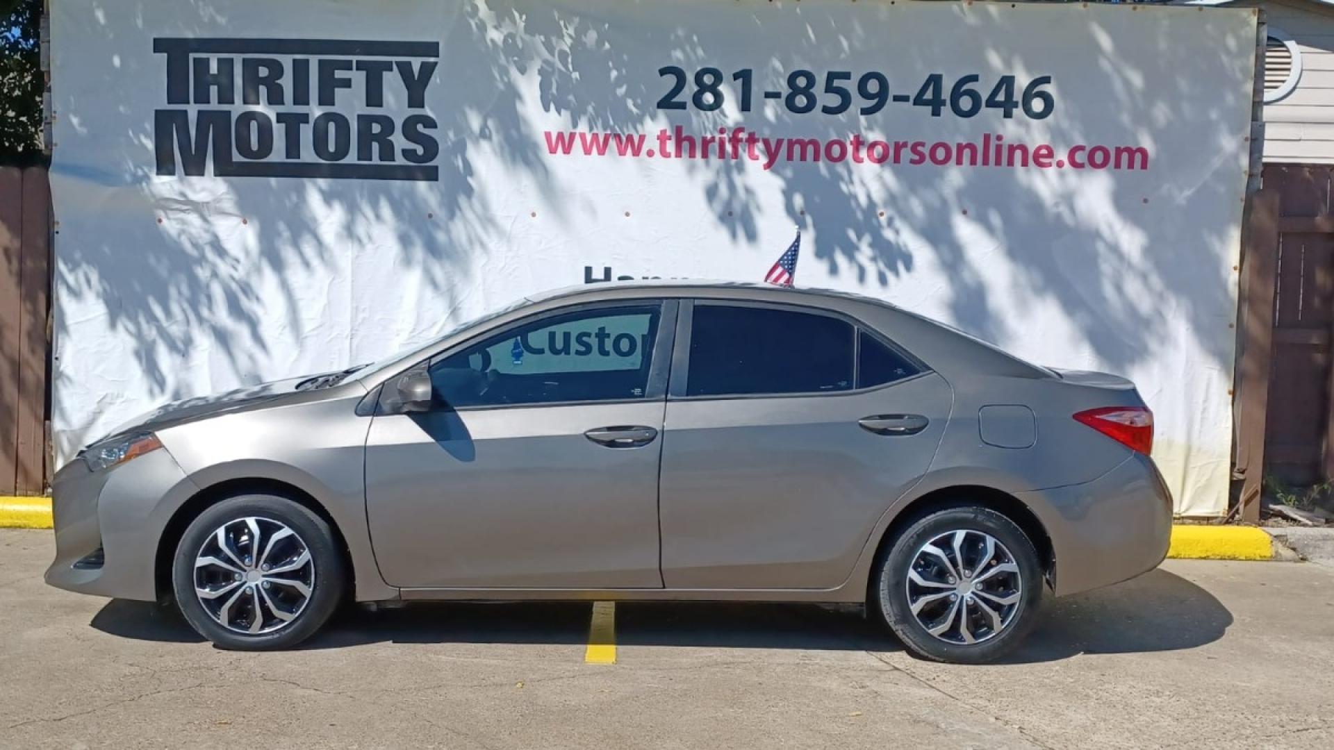 2018 Brown Toyota Corolla SE 6M (5YFBURHE7JP) with an 1.8L L4 DOHC 16V engine, 6M transmission, located at 16710 Clay Rd., Houston, TX, 77084, (281) 859-7900, 29.834864, -95.656166 - Low Down. Low Payments. - Photo#0